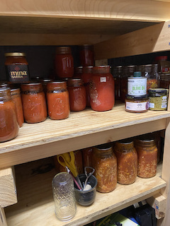 jars of soup on the pantry shelf