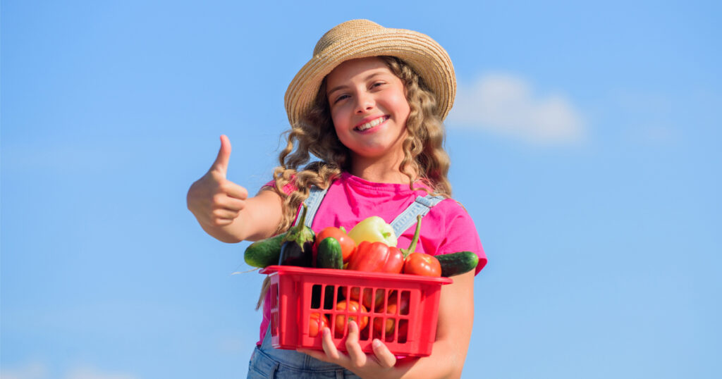 child with vegetables